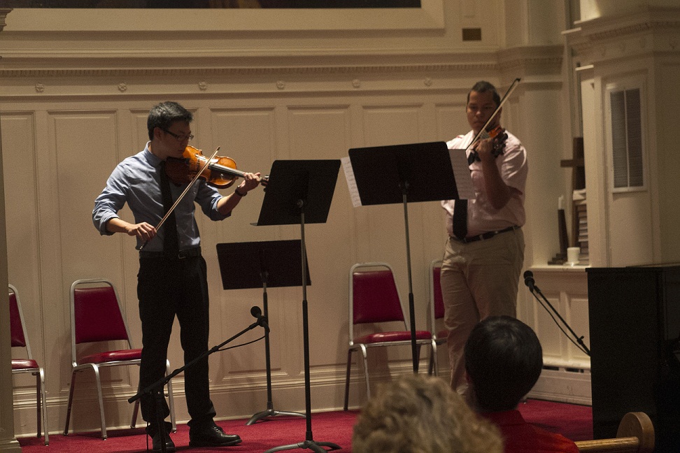 Kevin McClellan and Luis Ortiz performing a duet.