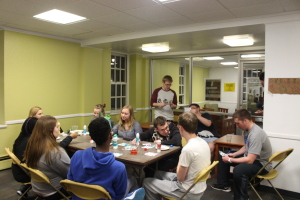 Students play environmental bingo in the main Whiteford lobby.