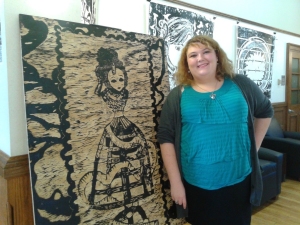 Maggie Heller posing with her woodblock