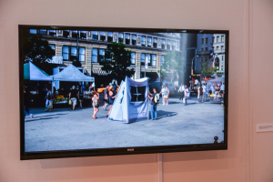 Todorova and Kostova utilized the asistance of strangers to hold and move their vinyl structure. Photo by Kyle Parks. 