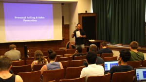 Professor Burdett helps his students prepare for the business world. Photo by Jeremy Simon.