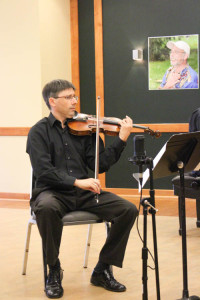 Nicholas Currie on the violin. Photo by Jimmy Calderon