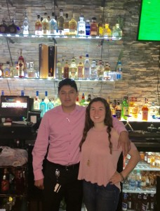 Cinco de Mayo manager Manny Goyo with McDaniel student Rachel Kling. Photo by James O'Connor.