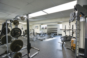 Much of the former armory's structure houses a family fitness center. Pictured is a weight room in the basement. Photo by Kyle Parks.