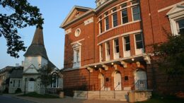 View of McDaniel College theater building and Little Baker Chapel in a sunset