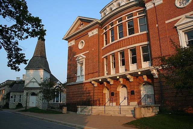 View of McDaniel College theater building and Little Baker Chapel in a sunset
