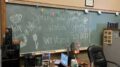 Message in colorful chalk inviting students to visit the Writing Center during April